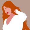 femme aux cheveux longs roux