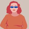 femme cheveux rouges et lunettes